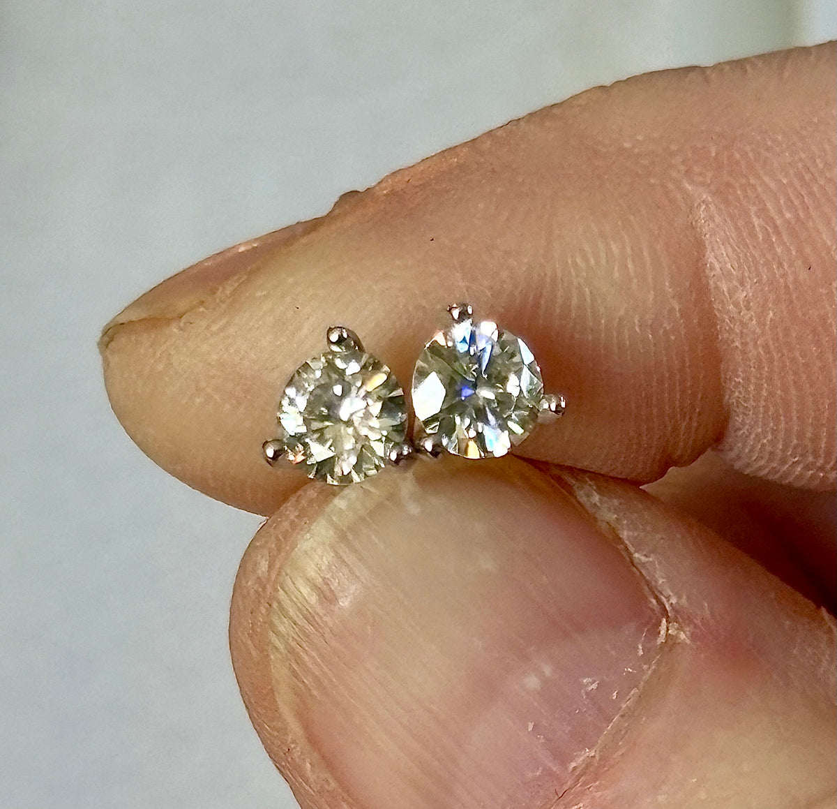 1ctw DOUBLE certified Moissanite studs, D-color and VVS1 clarity in delicate 3-claw settings! Minimalist design with substantial fire!