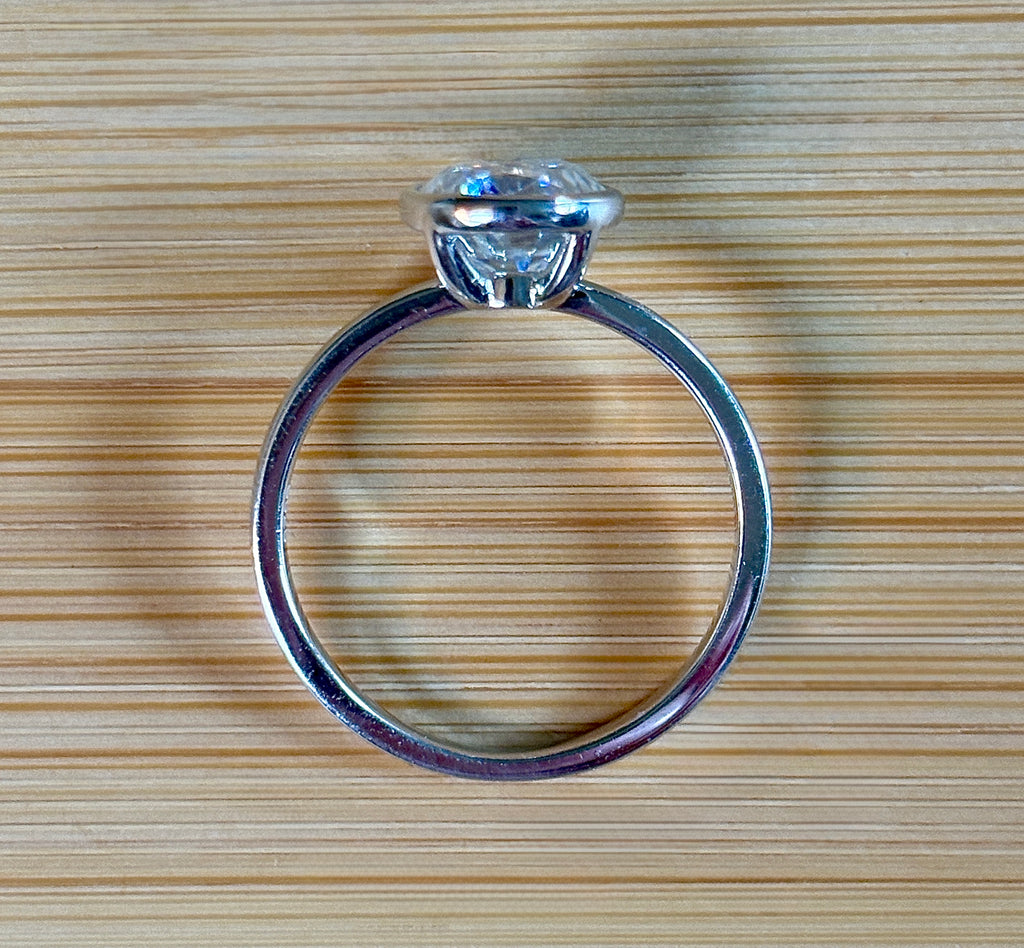 Moissanite ring. A 3ct oval in a hybrid basket + bezel of sterling OR Argentium silver! A Hand Knotted Jewelry EXCLUSIVE!