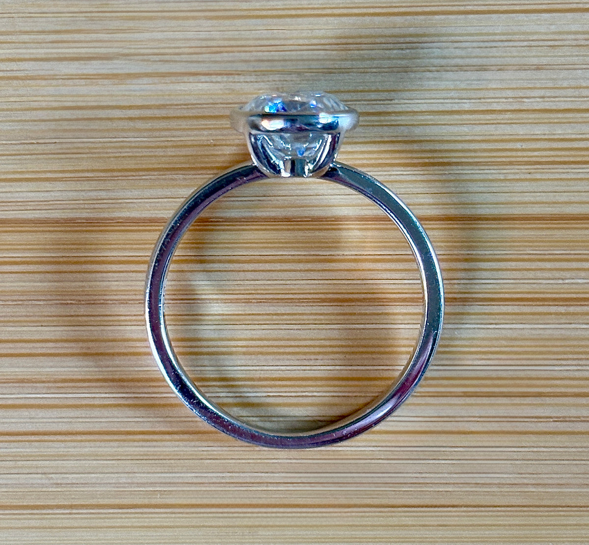 Moissanite ring. A 3ct oval in a hybrid basket + bezel of sterling OR Argentium silver! A Hand Knotted Jewelry EXCLUSIVE!