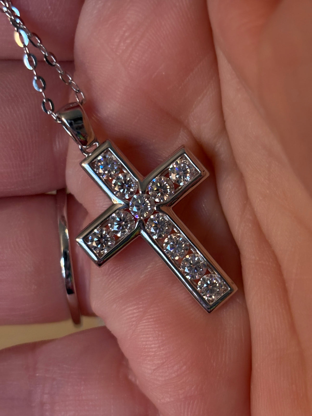 Moissanite necklace. A beautiful 2.2cttw certified Moissanite cross with channel-style stone setting. Classy, elegant, contemporary and très chic!