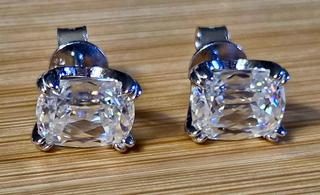 6ctw Ashoka-cut Moissanites in Argentium silver, hand-cut by a Master lapidary! These studs are the highest of the high end!