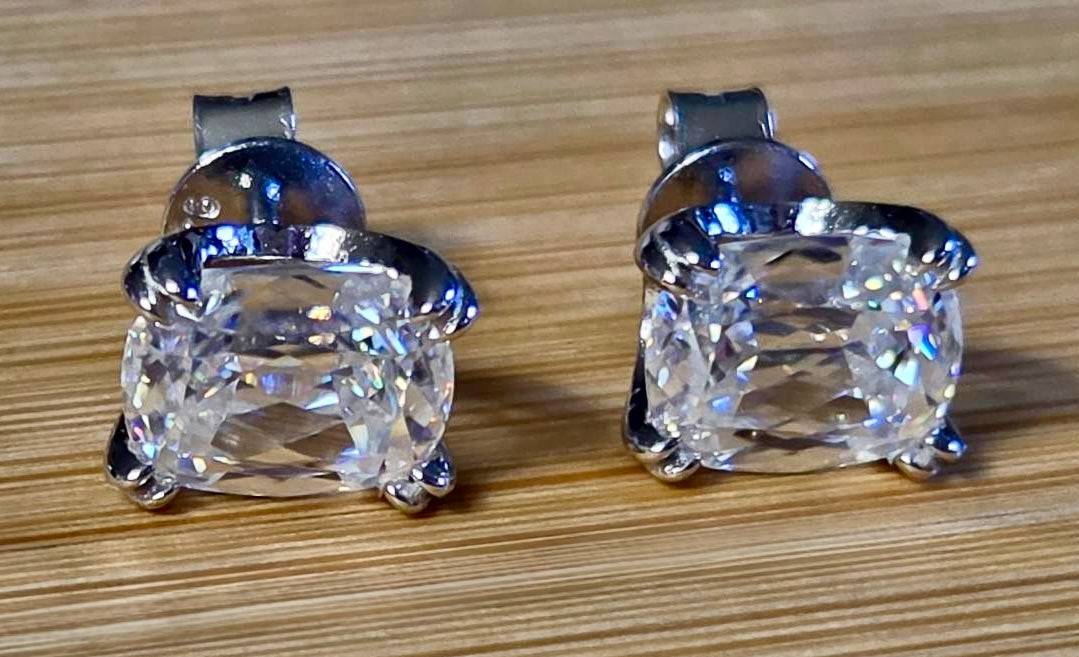 6ctw Ashoka-cut Moissanites in Argentium silver, hand-cut by a Master lapidary! These studs are the highest of the high end!