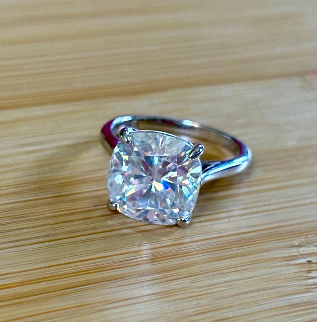 Moissanite ring. A 9ct certified cushion-cut *crushed ice* faceted Moissanite solitaire statement ring. Did someone order extra sparkles?!