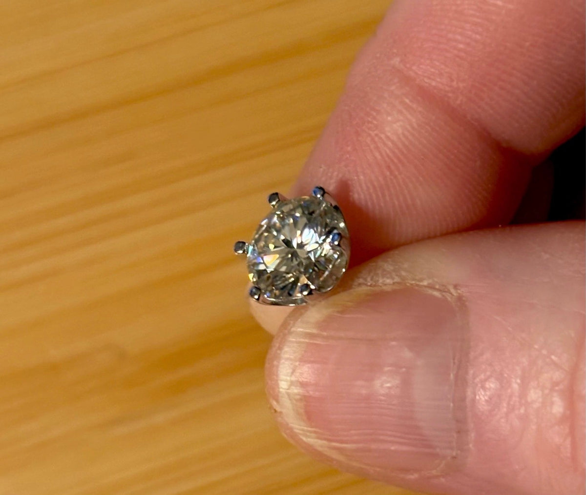 A certified pair of pretty, floral-inspired 2cttw or 4cttw Moissanite studs in poinsettia-shaped settings w/screwball backs OR 4cttw w/push backs!