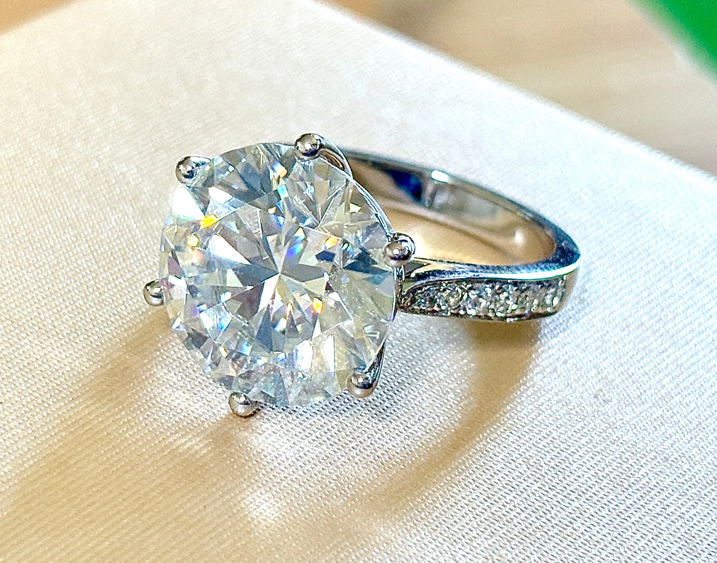 Moissanite ring. The 10ct certified 8H8A Moissanite “Tulip” statement ring with .50cttw Moissanite accents! Photos fail this GORGEOUS ring!