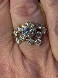 Moissanite ring. The “Moissanite Galaxy” ring features a 3ct certified Moissanite amid a 4cttw Moissanite constellation  - a 7cttw ring!