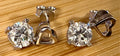 Moissanite earrings. Certified 2cttw round brilliant Moissanites dangling from heart-shaped posts are perfect for your Valentine (or you)!