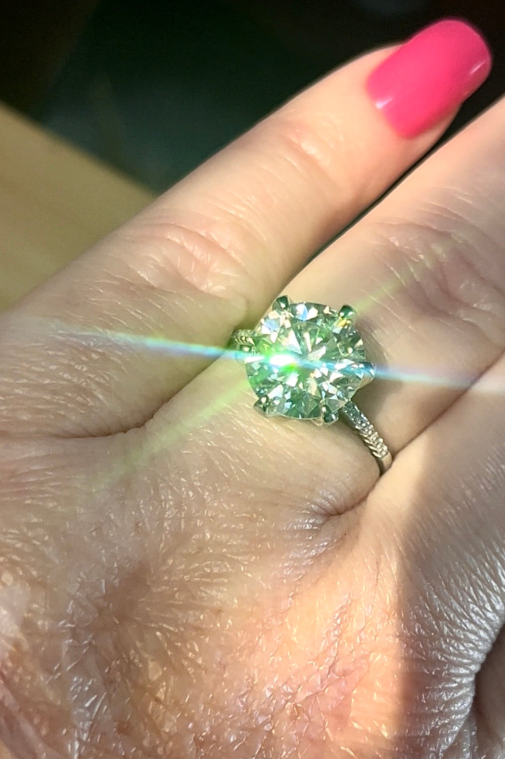 Moissanite ring. A certified 5ct Moissanite solitaire with zircon-accented shoulders, set in sterling silver and bathed in 18k!
