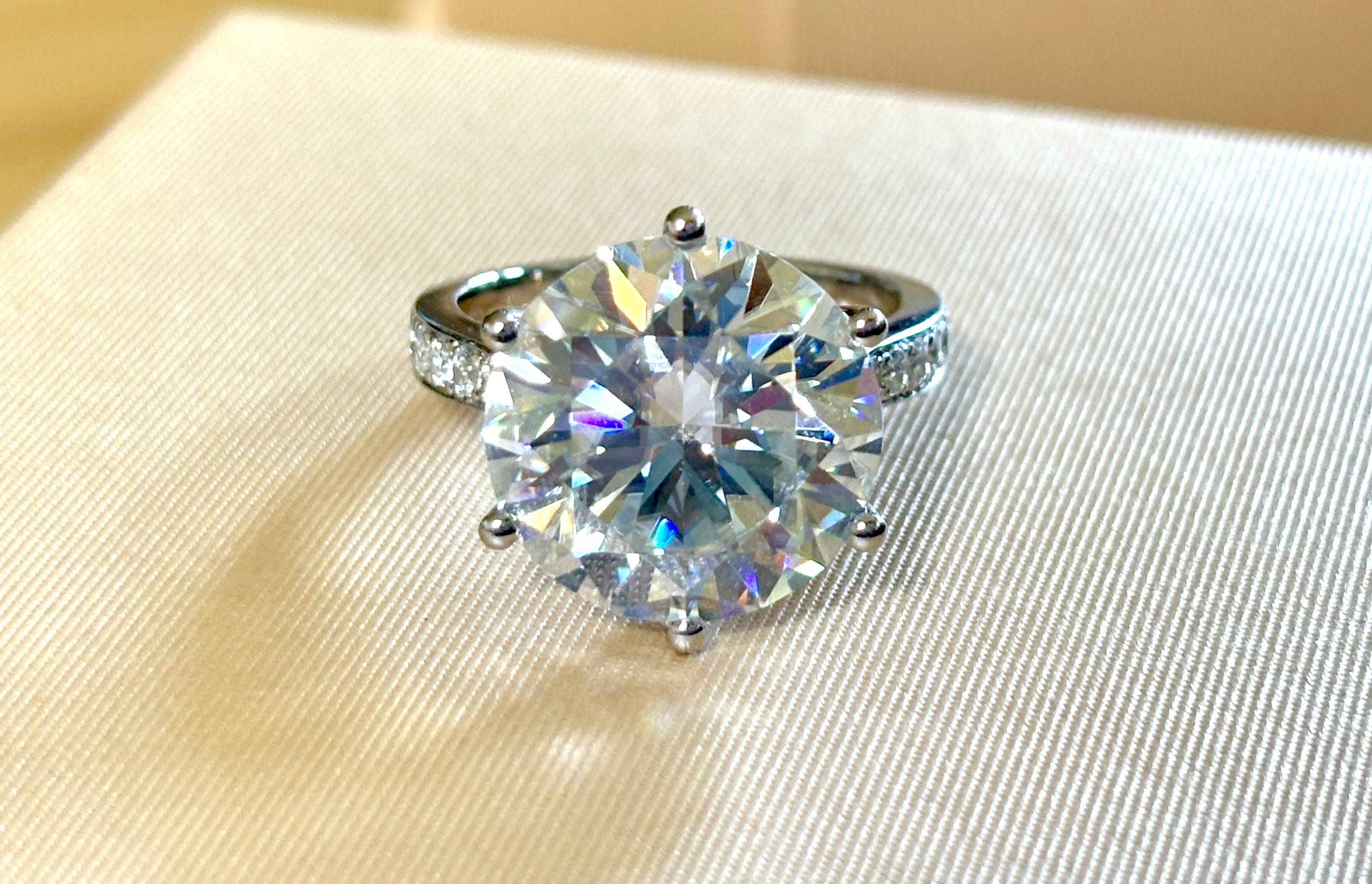 Moissanite ring. The 10ct certified 8H8A Moissanite “Tulip” statement ring with .50cttw Moissanite accents! Photos fail this GORGEOUS ring!