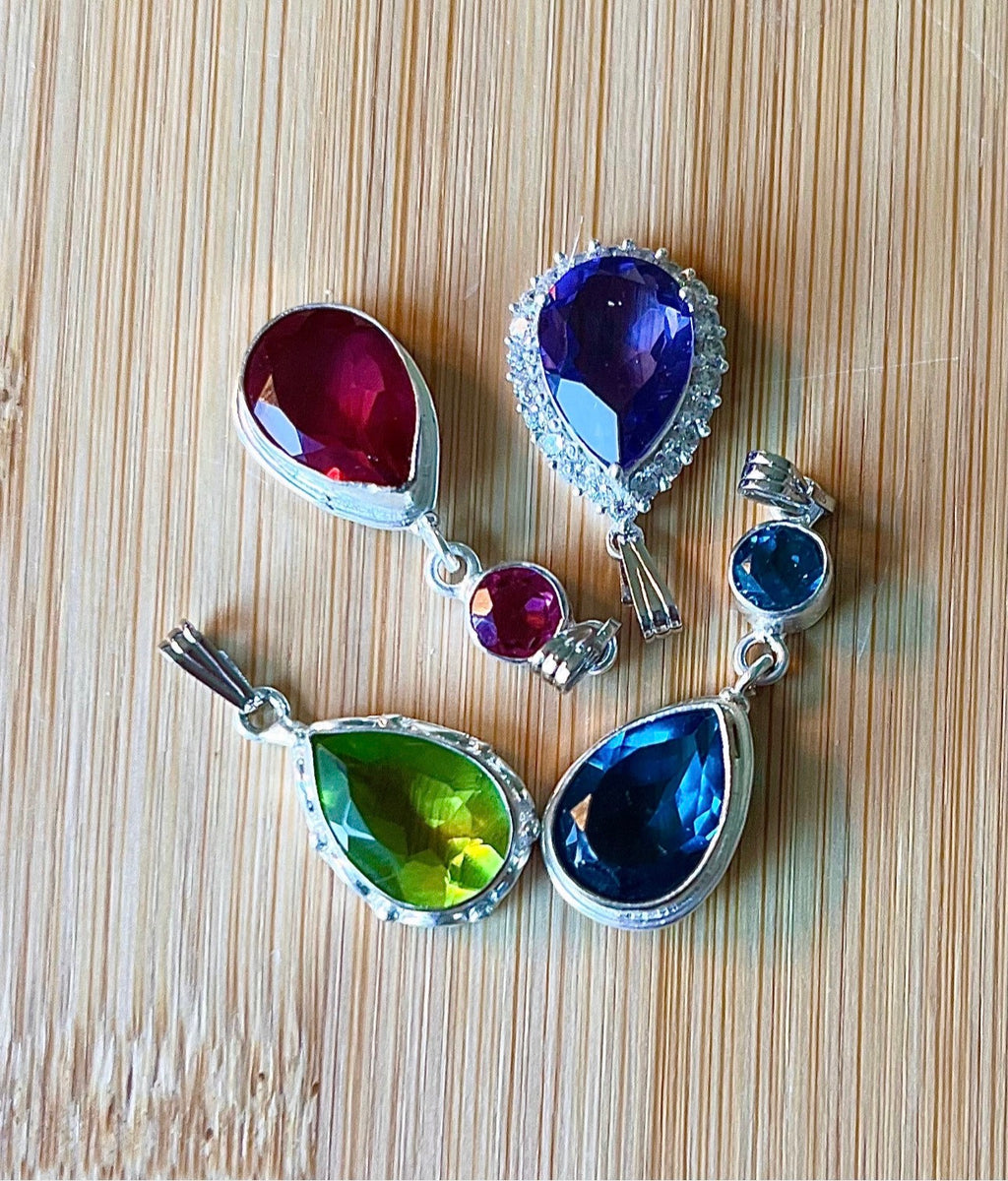GENUINE gemstone pendants set in 925 sterling silver! Lab-grown and 100% identical to nature-grown in every way except the high price tag!