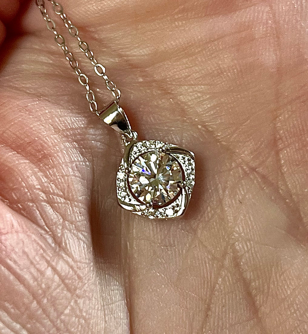 Moissanite necklace. Certified 1ct Moissanite “Quasar” design pendant! Be the star of the show wearing this unique, contemporary design!