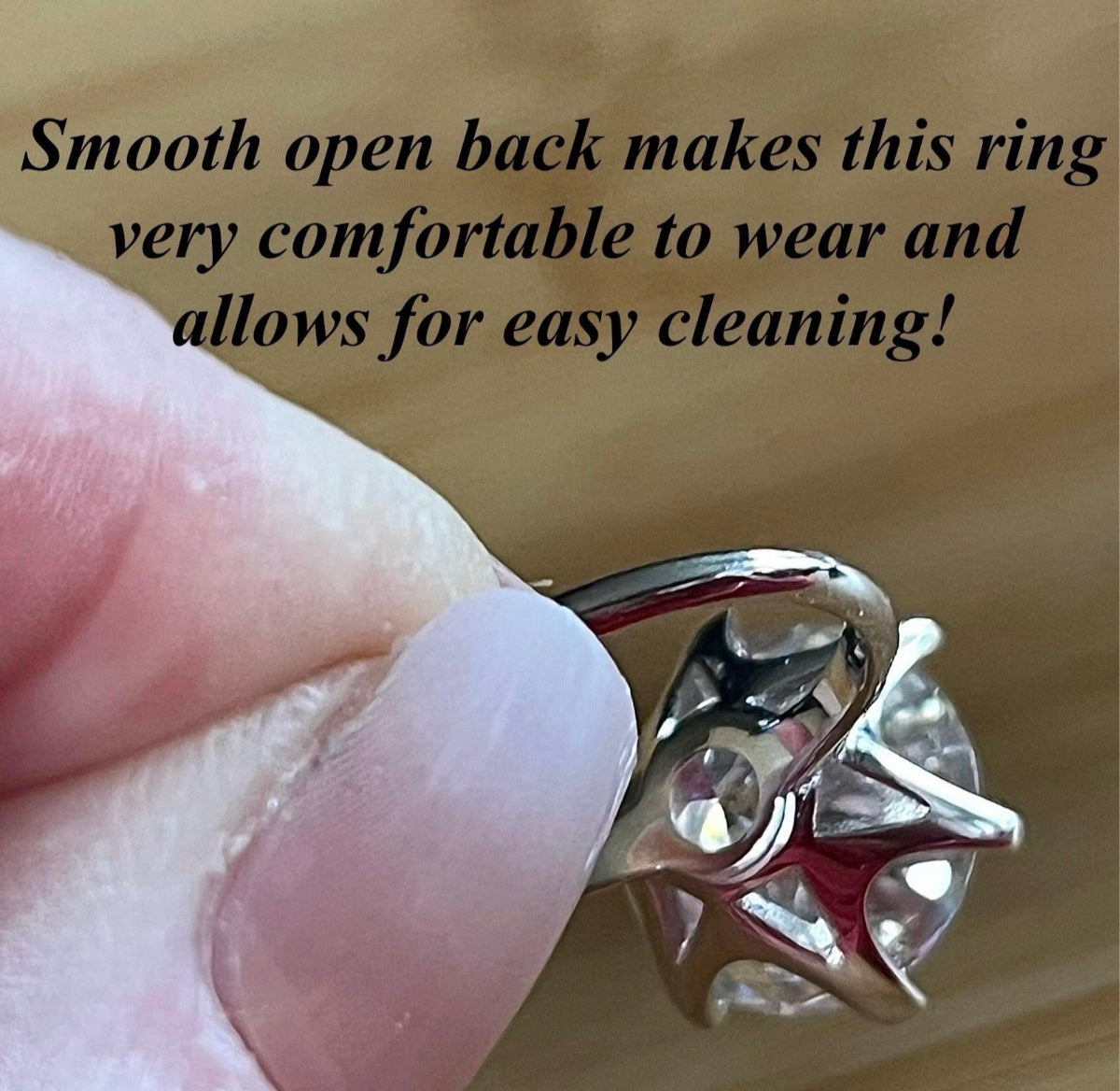 Moissanite ring. A gorgeous 10ct certified round brilliant Moissanite in a lovely crown setting, with 6 prongs and a sleek plain band!