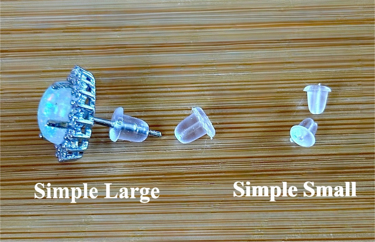 Locking earring backs (stainless steel), sterling silver replacement backs, sterling silver “UFO” security backs and silicone backs.