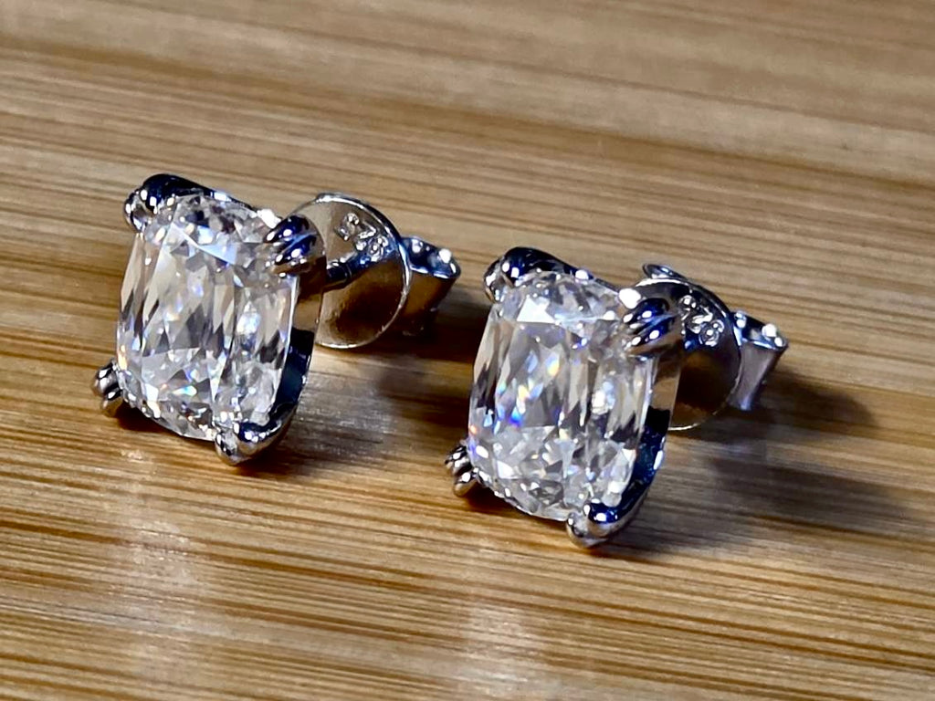 6ctw Ashoka-cut Moissanites in Argentium silver, hand-cut by a Master lapidary! These studs are the highest of the high end!