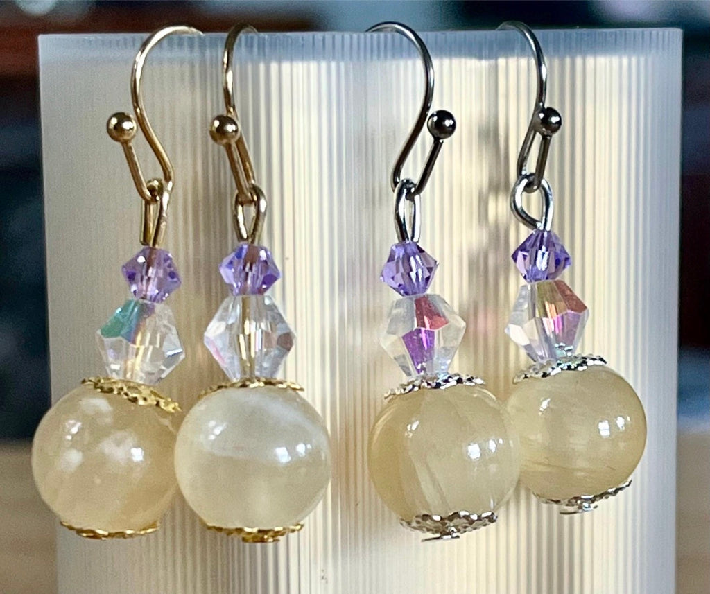 Silky yellow quartz bracelet. Chatoyant 10mm buttercream quartzite (AKA silk jade) hand-knotted bracelet with METALLIC string!
