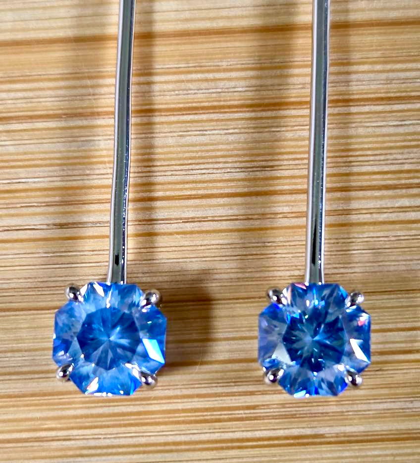 8ctw Moissanite pendulum earrings, with 3ct octagonal frosty aquamarine Moissanites at the bottom of the pendulum, and 1ct white round brilliant Moissanites at the top! Full Argentium silver construction with sterling silver disk backs! An HKJ exclusive!