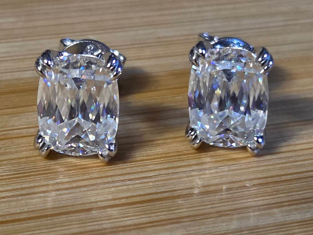 6ctw Ashoka-cut Moissanites in Argentium silver, hand-cut by a Master lapidary! These studs are the highest of the high end!
