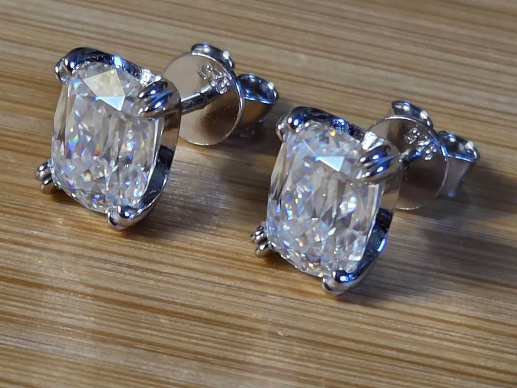 6ctw Ashoka-cut Moissanites in Argentium silver, hand-cut by a Master lapidary! These studs are the highest of the high end!