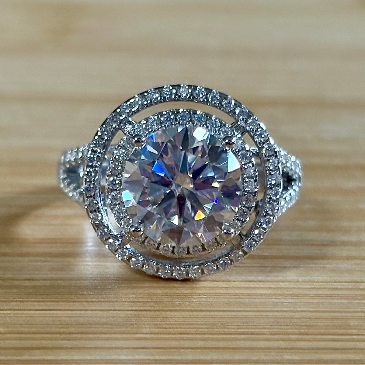 Moissanite ring. The 6.64cttw *fully* Moissanite “Bull’s Eye” ring, featuring a 4ct certified round brilliant Moissanite in a double halo!