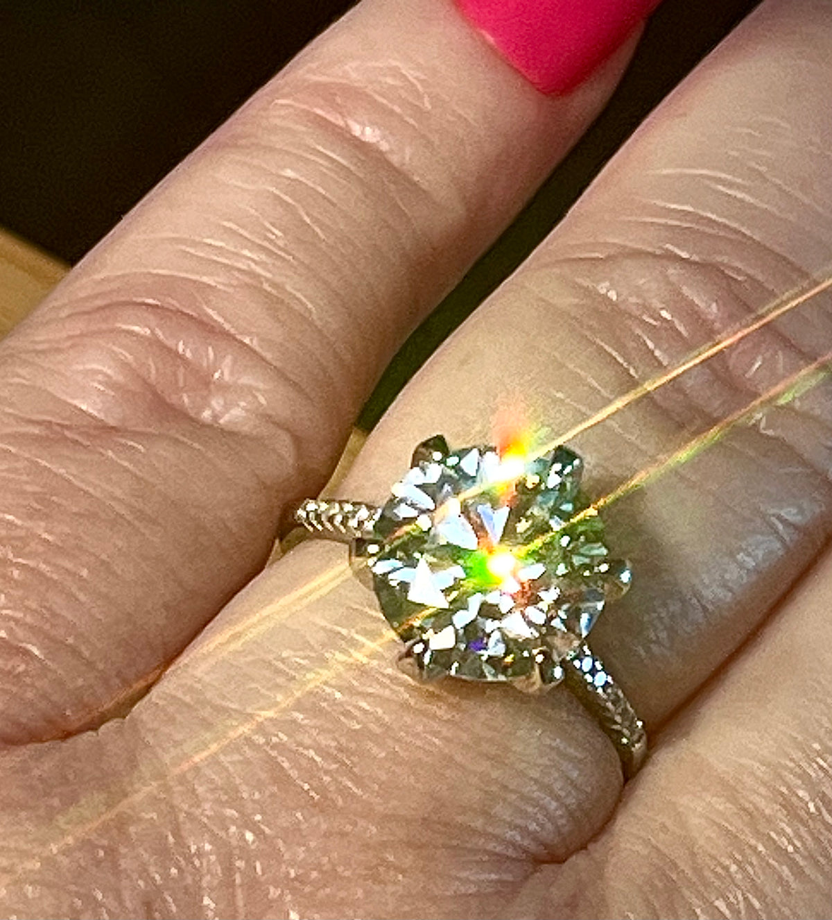 Moissanite ring. A certified 5ct Moissanite solitaire with zircon-accented shoulders, set in sterling silver and bathed in 18k!