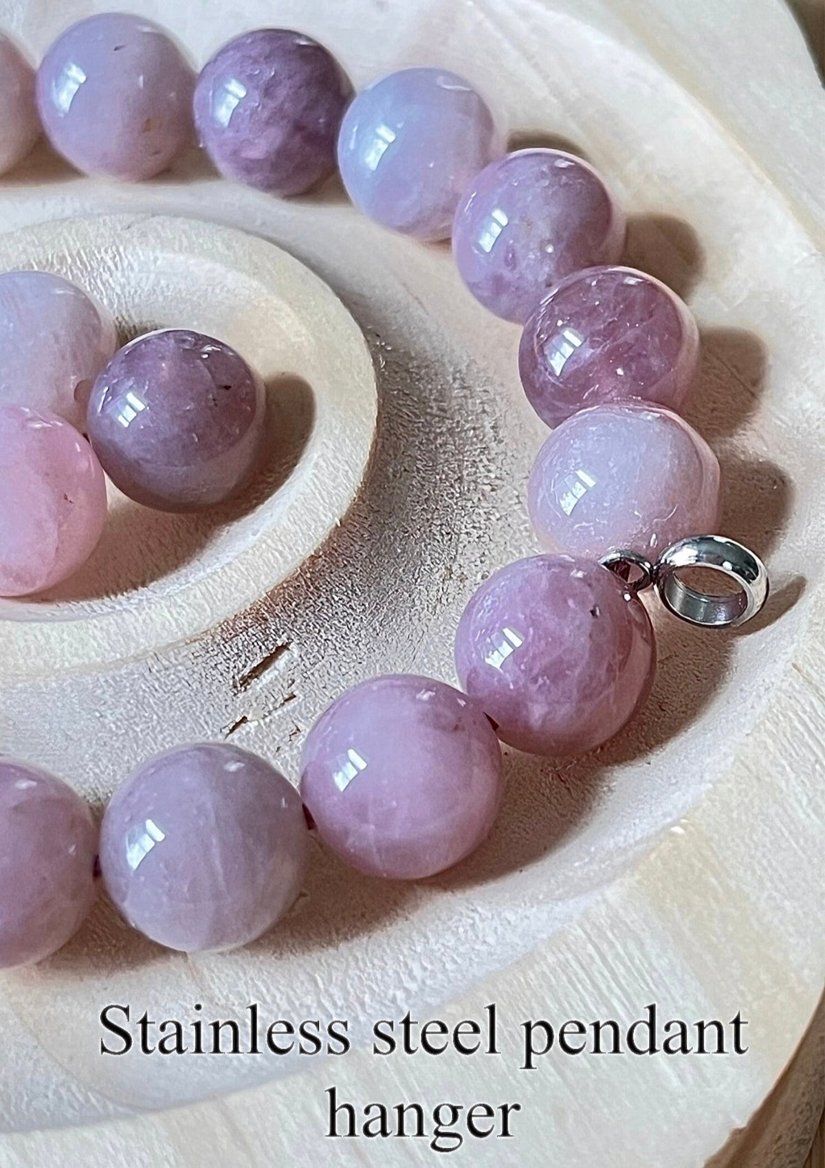 Madagascar rose quartz bracelet. Hands-down GORGEOUS AAA-grade 10.5mm purple-pink rose quartz beads and with varying degrees of crystallization and color!
