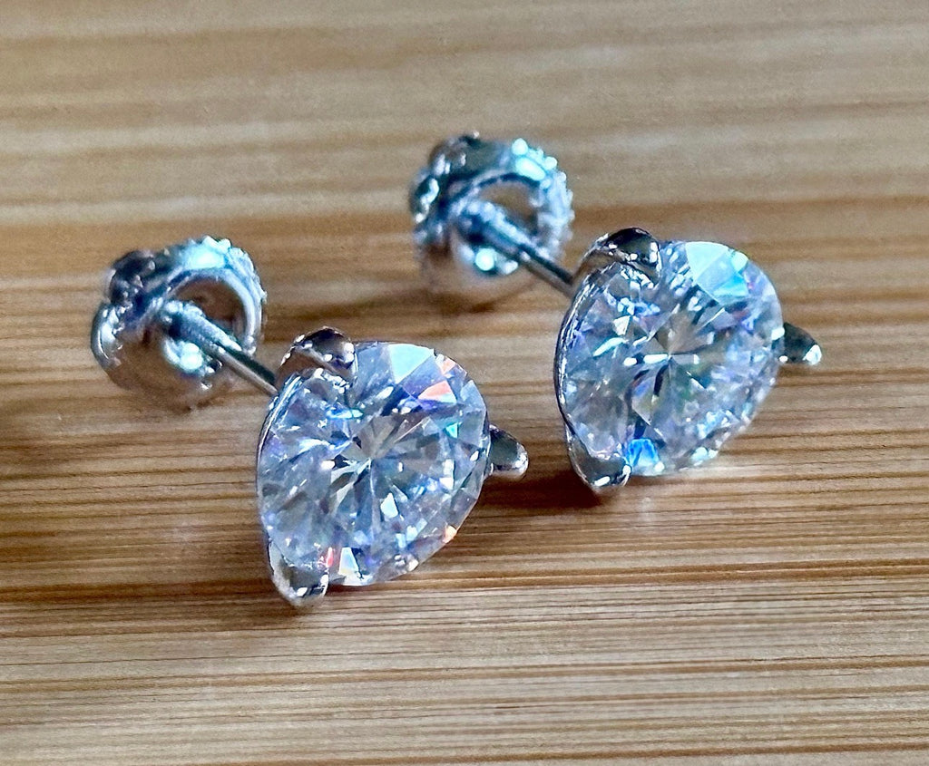 Moissanite earrings. A 4cttw certified pair of Moissanite martini studs with screw-on ear nuts - a simply elegant, classic & STUNNING pair!