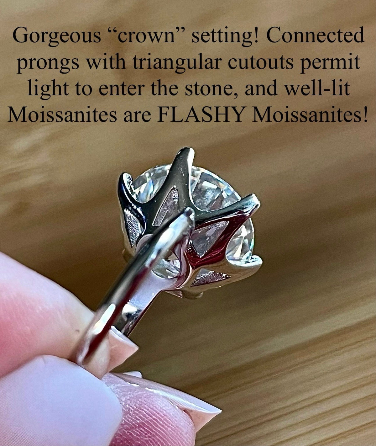 Moissanite ring. A gorgeous 10ct certified round brilliant Moissanite in a lovely crown setting, with 6 prongs and a sleek plain band!