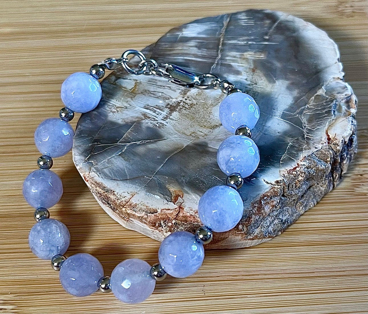 Aquamarine bracelets and/or earrings. Faceted 10mm aquamarines with your choice of crystal or stainless steel station beads and stainless steel color!