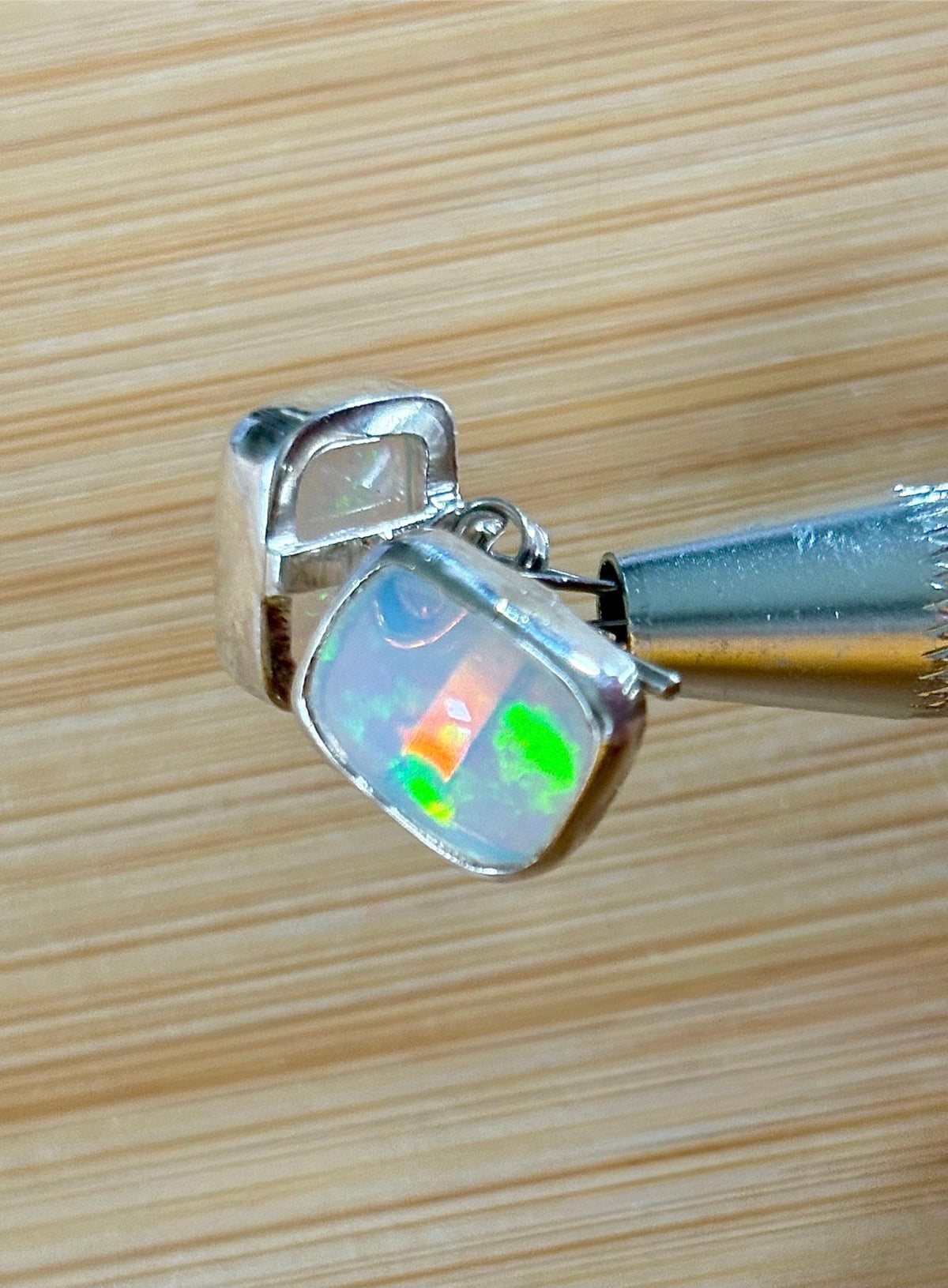 Ethiopian opal earrings, pair B. A beautiful pair of rectangular Ethiopian opal earrings, approximately 4cttw and hand-set in sterling silver bezels!