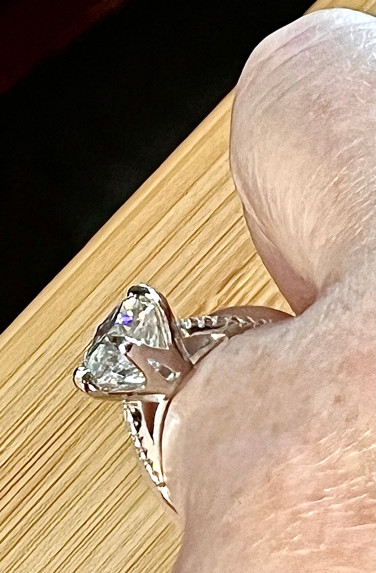 Moissanite ring. A certified 5ct Moissanite solitaire with zircon-accented shoulders, set in sterling silver and bathed in 18k!
