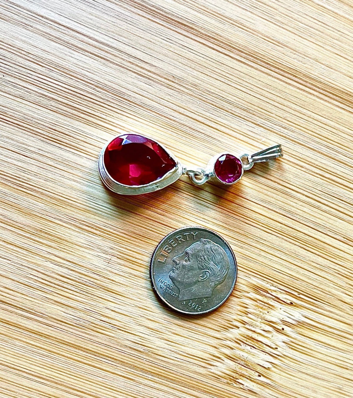 GENUINE gemstone pendants set in 925 sterling silver! Lab-grown and 100% identical to nature-grown in every way except the high price tag!