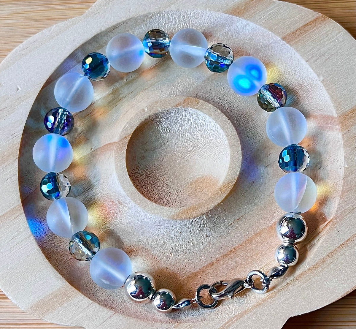 Austrian crystal bracelet with your choice of 6mm or 10mm frosted crystal beads, with golden or silvery stainless steel hardware.
