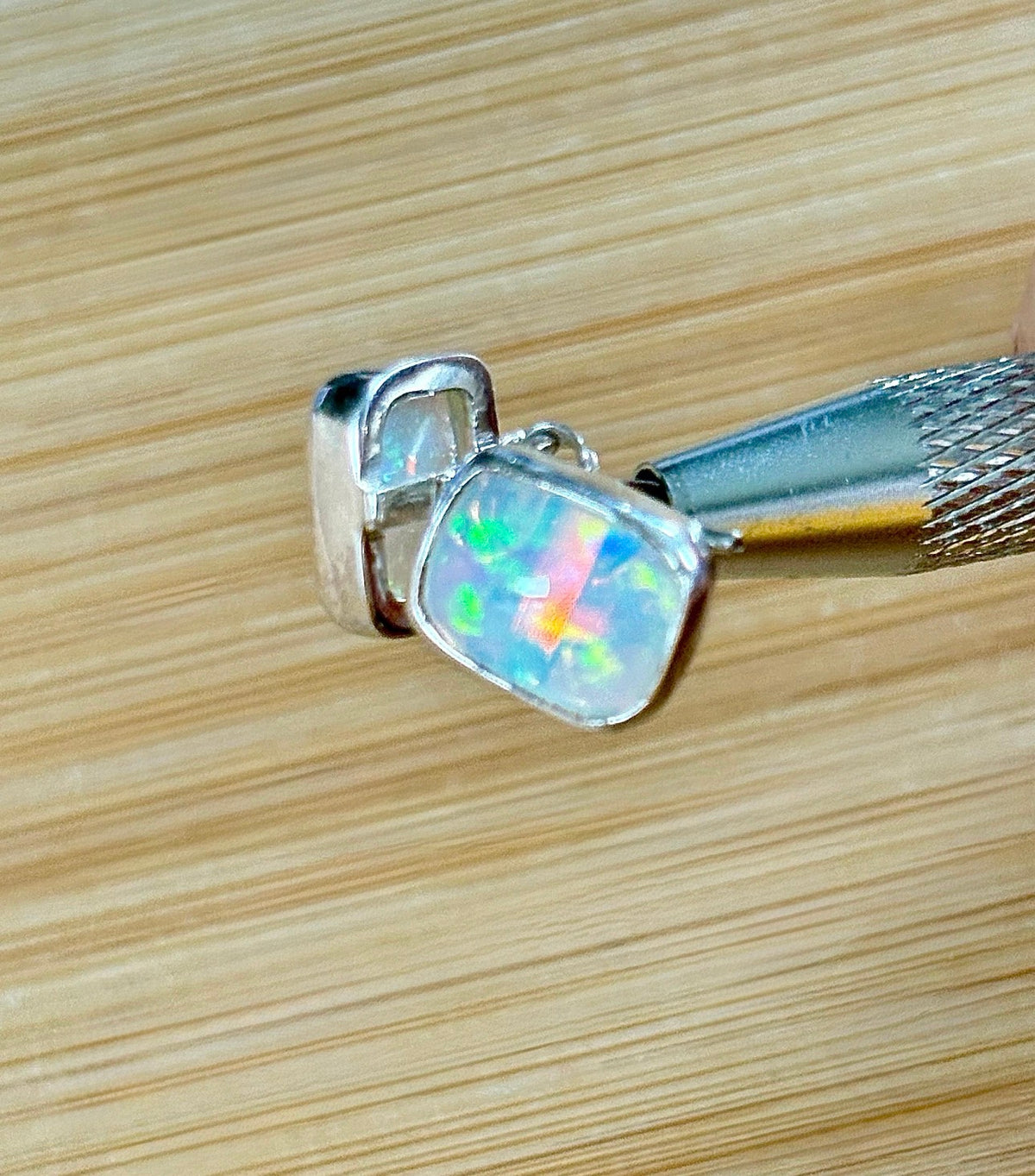 Ethiopian opal earrings, pair B. A beautiful pair of rectangular Ethiopian opal earrings, approximately 4cttw and hand-set in sterling silver bezels!