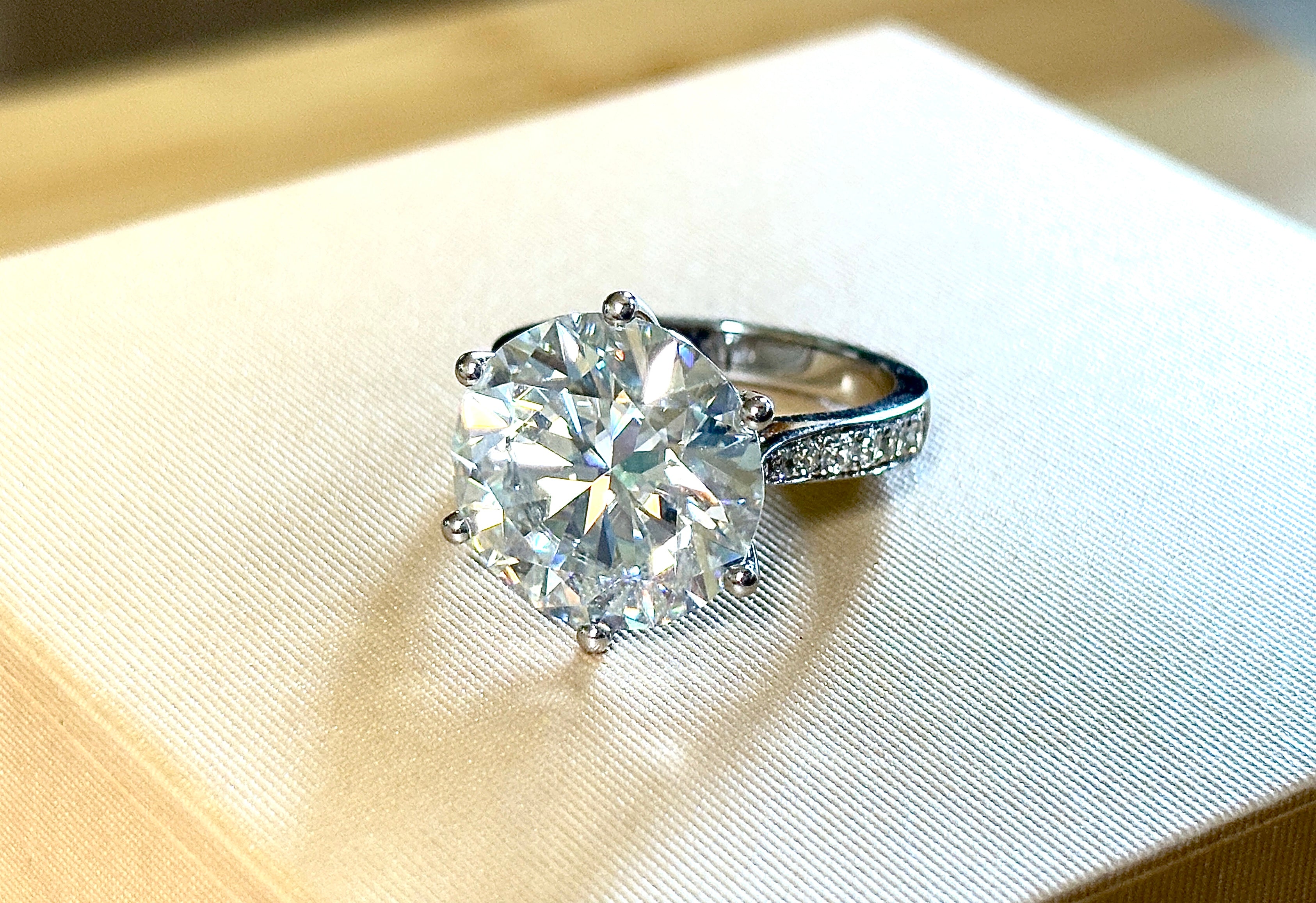Moissanite ring. The 10ct certified 8H8A Moissanite “Tulip” statement ring with .50cttw Moissanite accents! Photos fail this GORGEOUS ring!