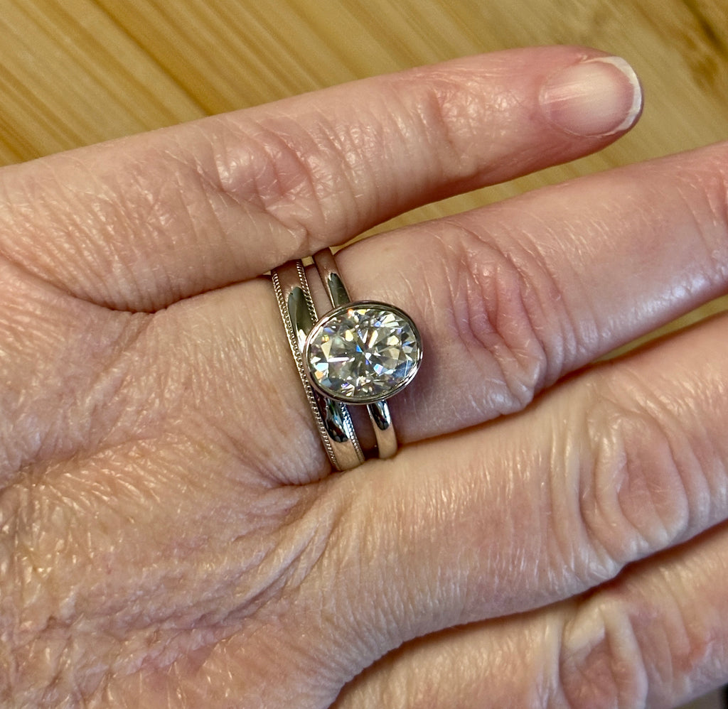 Moissanite ring. A 3ct oval in a hybrid basket + bezel of sterling OR Argentium silver! A Hand Knotted Jewelry EXCLUSIVE!