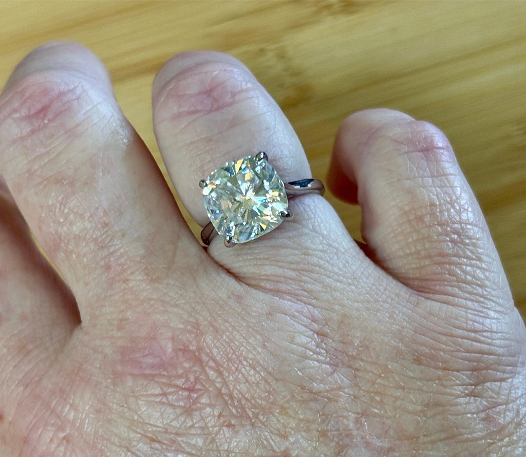 Moissanite ring. A 9ct certified cushion-cut *crushed ice* faceted Moissanite solitaire statement ring. Did someone order extra sparkles?!