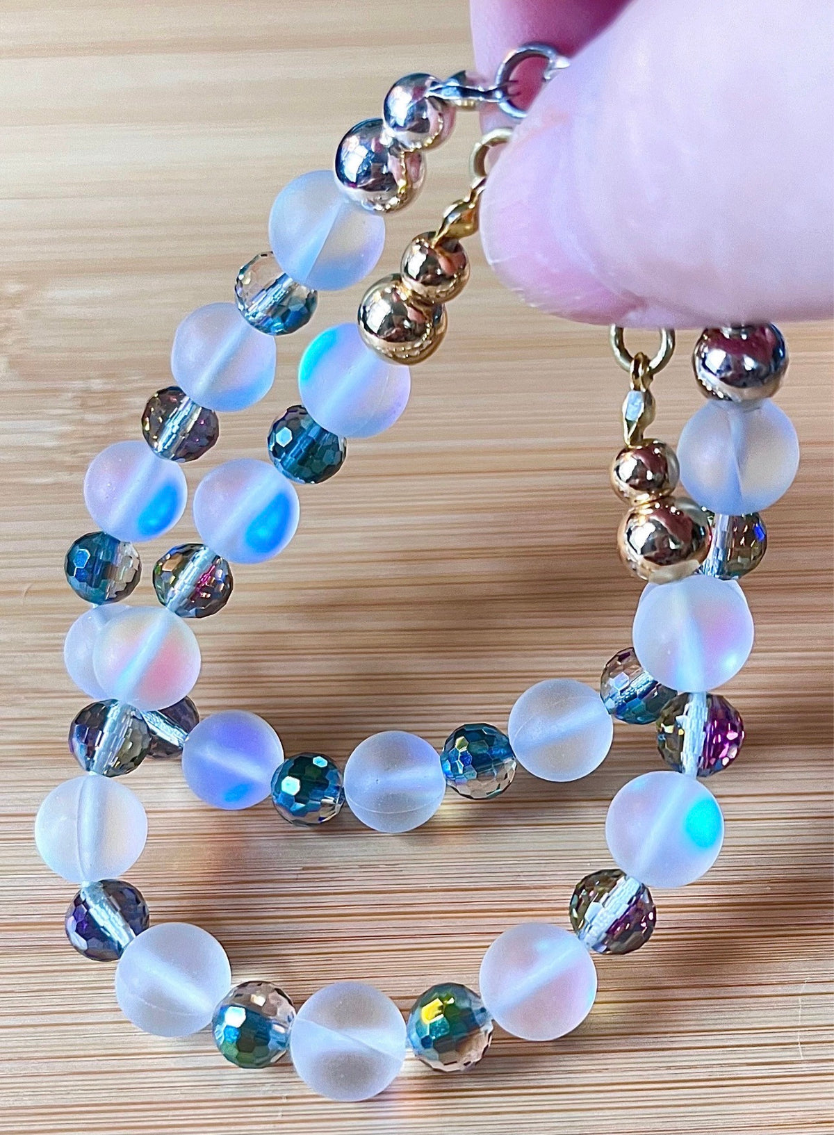 Austrian crystal bracelet with your choice of 6mm or 10mm frosted crystal beads, with golden or silvery stainless steel hardware.