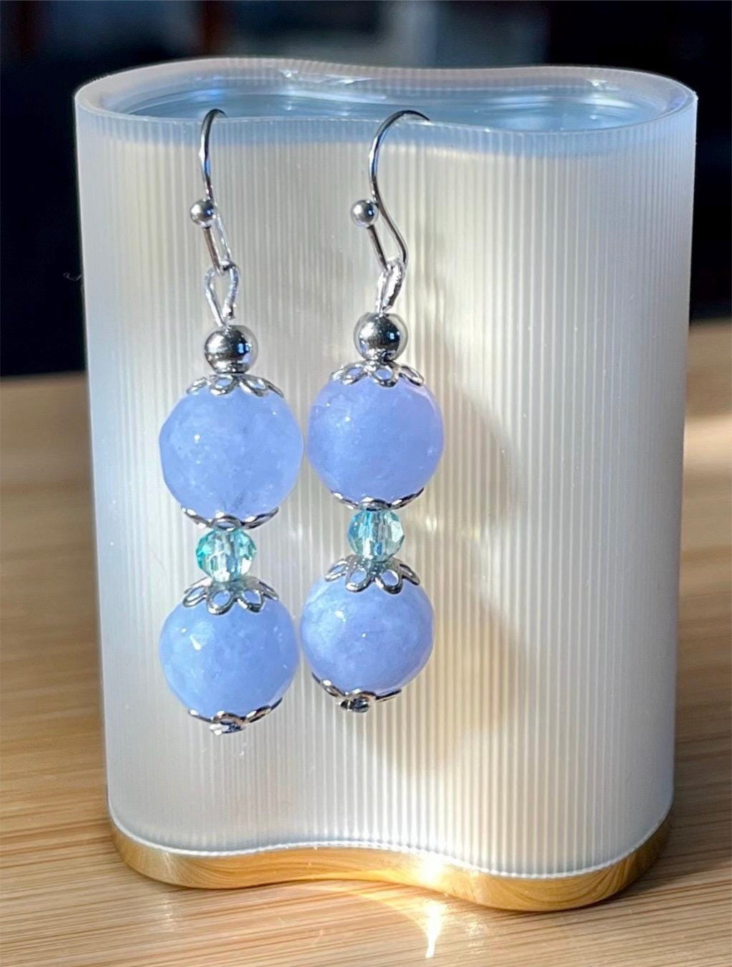Aquamarine bracelets and/or earrings. Faceted 10mm aquamarines with your choice of crystal or stainless steel station beads and stainless steel color!
