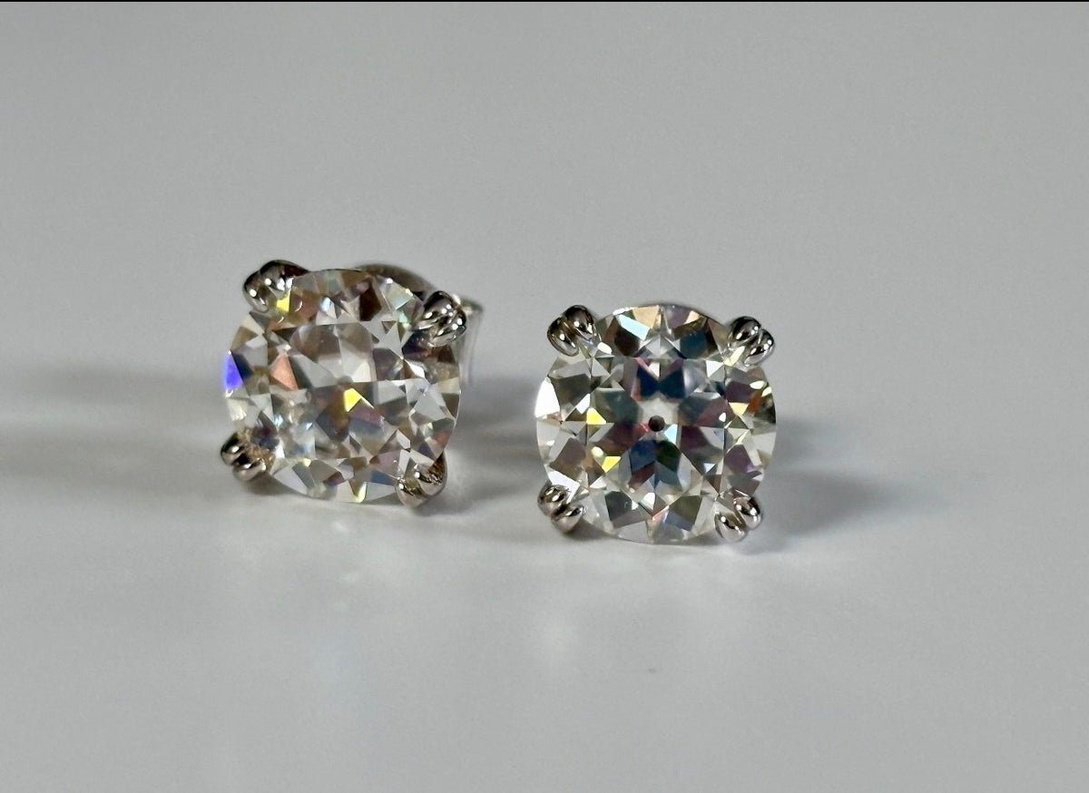 A lovely DOUBLE certified pair of 4cttw Old European Cut Moissanite studs in 935 Argentium silver and 18k double-claw mountings!