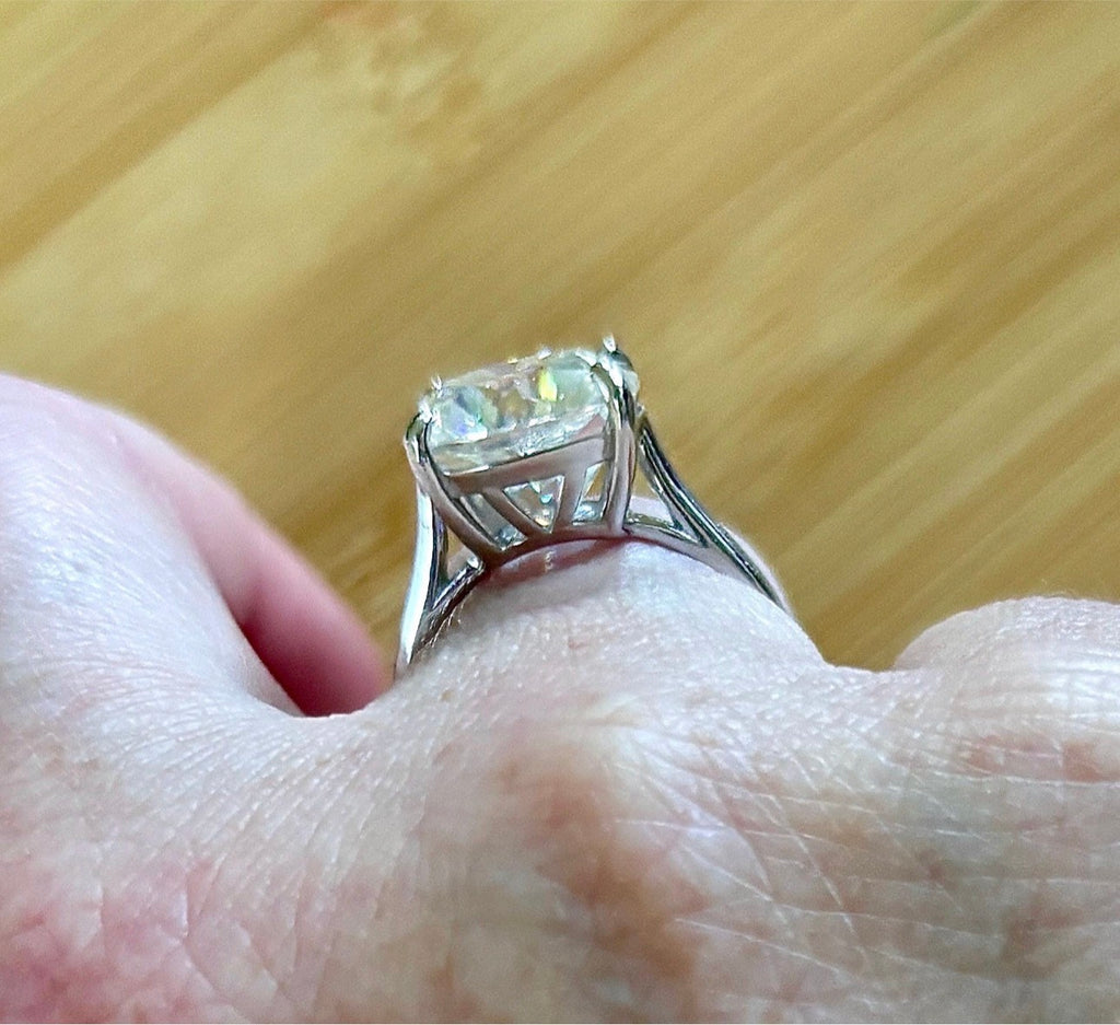 A fiery 9ct certified CLASSIC cushion-cut Moissanite solitaire, the ring of a certain princess (ex-princess?), but without the royal price tag! So indulge!