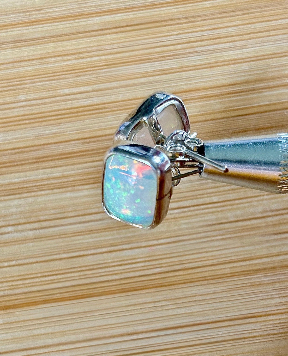 Ethiopian opal earrings, pair B. A beautiful pair of rectangular Ethiopian opal earrings, approximately 4cttw and hand-set in sterling silver bezels!