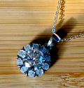 Moissanite necklace. A 3ct certified round brilliant Moissanite in a snowflake-shaped pendant ! A perfect piece for the holidays and beyond!