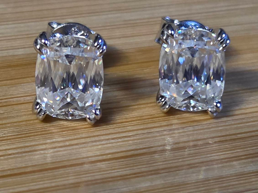 6ctw Ashoka-cut Moissanites in Argentium silver, hand-cut by a Master lapidary! These studs are the highest of the high end!