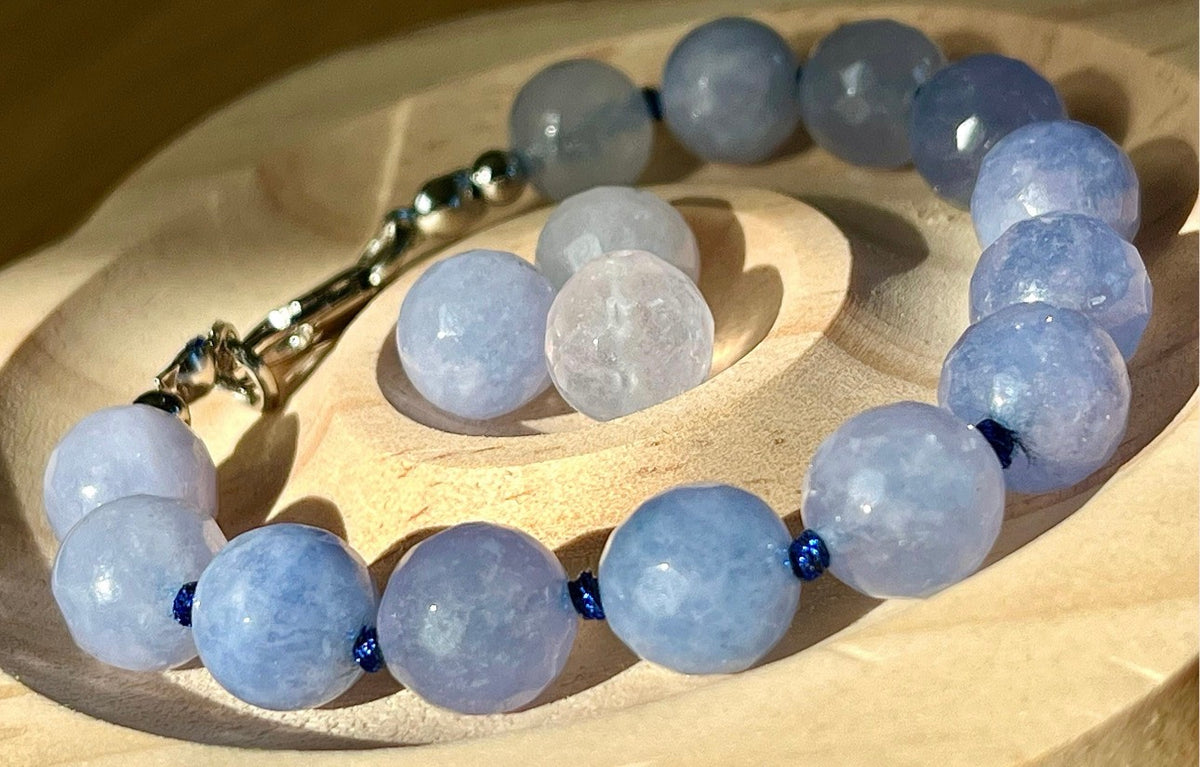 Aquamarine bracelet and/or earrings. The “Silent Night” faceted aquamarine hand knotted bracelet with METALLIC string and your choice of yellow gold plated or silvery stainless steel bracelet hardware!