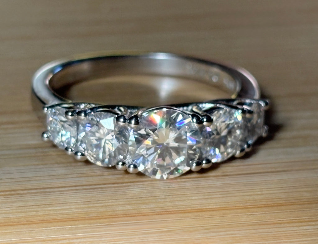 Moissanite ring. A 2.5ctw certified Moissanite ring, for those who want plenty of sparkle but a daintier ring! This feminine 5-stone design is just the thing!