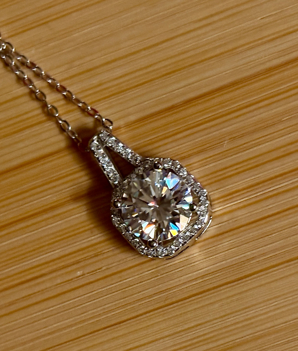 Moissanite necklace. A 2ct certified Moissanite set within an octagonally-shaped halo of pavé-set gleaming white zircons - at a 1ct price!