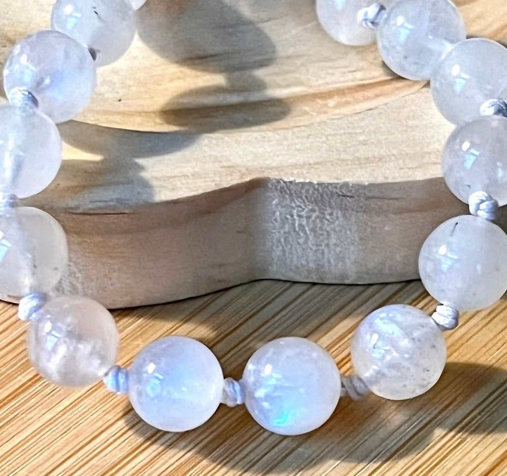Glowing moonstone bracelet. High quality hand knotted 8mm moonstone bracelet with stainless steel or yellow gold plated stainless steel hardware!