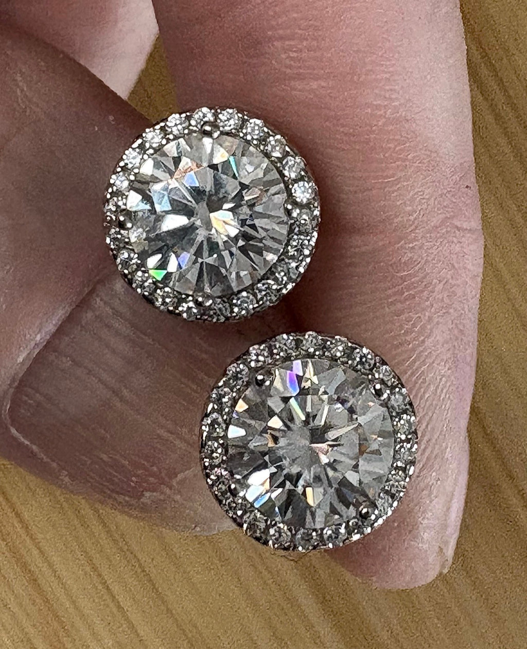 Moissanite earrings. A glittering 5.44cttw pair of certified Moissanites and white zircons in 18k gold-embraced sterling silver! Perfection!