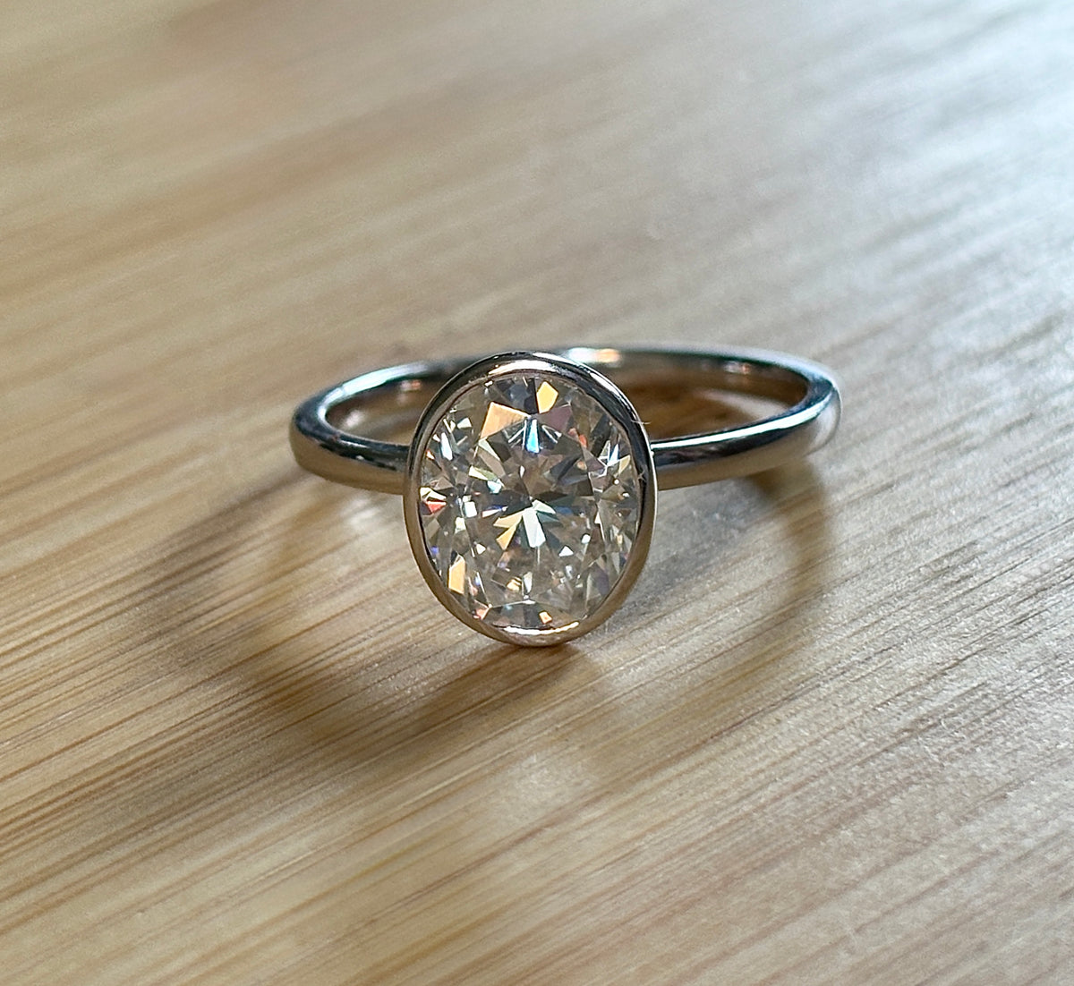 Moissanite ring. A 3ct oval in a hybrid basket + bezel of sterling OR Argentium silver! A Hand Knotted Jewelry EXCLUSIVE!