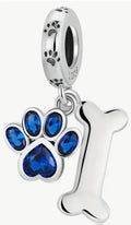 Paw print charms, dog lover charms, dog bone charms, turtle charm and cross charm! All solid sterling silver charms!